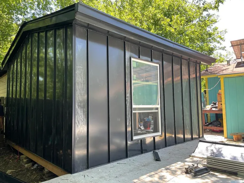 Black standing seam metal wall panels for Metal Roof Installation in Warrenton